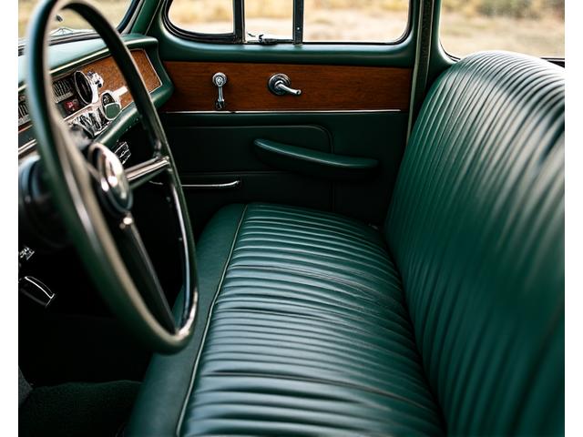 Before and after view of a classic car interior restoration, showing period-correct green leather and chrome details.