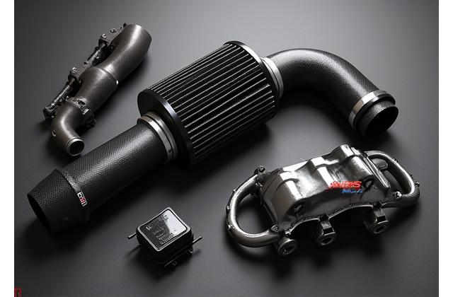 Custom car parts arranged aesthetically, high-end materials.